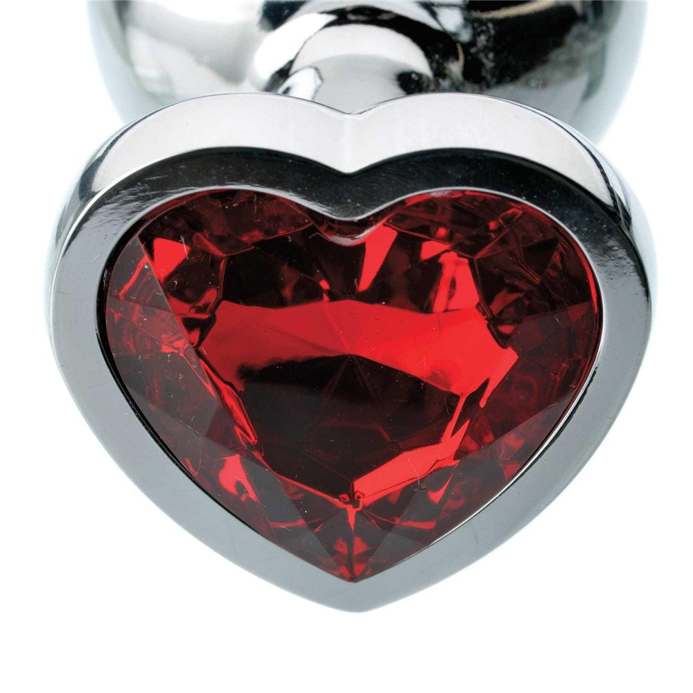 Adam & Eve Red Hearts Gem Anal Plug Medium featuring a polished aluminum finish and a sparkling red heart gem base.