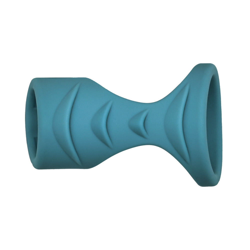 Adam & Eve Adams Ridged Penis Cage in textured silicone, designed for enhanced stimulation and support during intimate play.