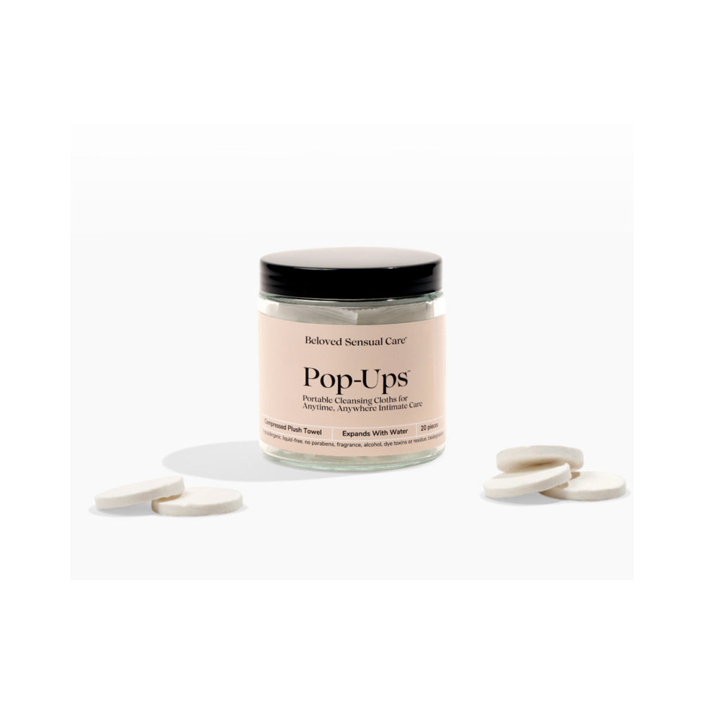 Beloved Pop-Up Cleansing Cloths jar with tablets for convenient personal hygiene on-the-go.