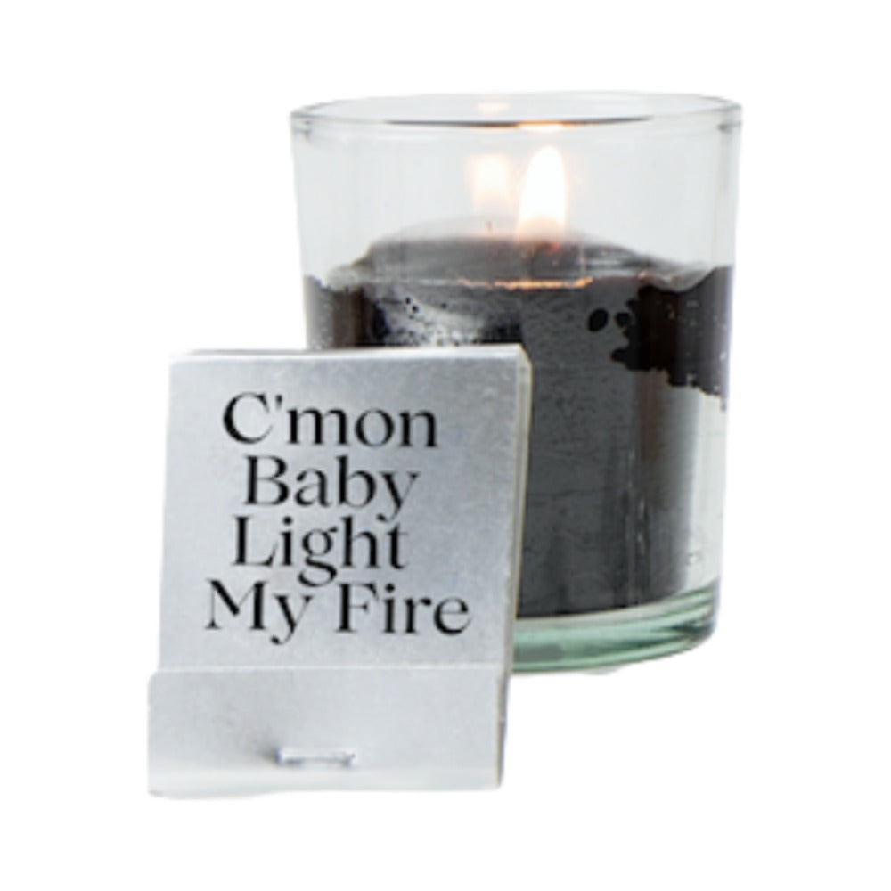 Beloved Get Naked Date Night Gift Set candle with flame and matchbook featuring 'C'mon Baby Light My Fire' text.