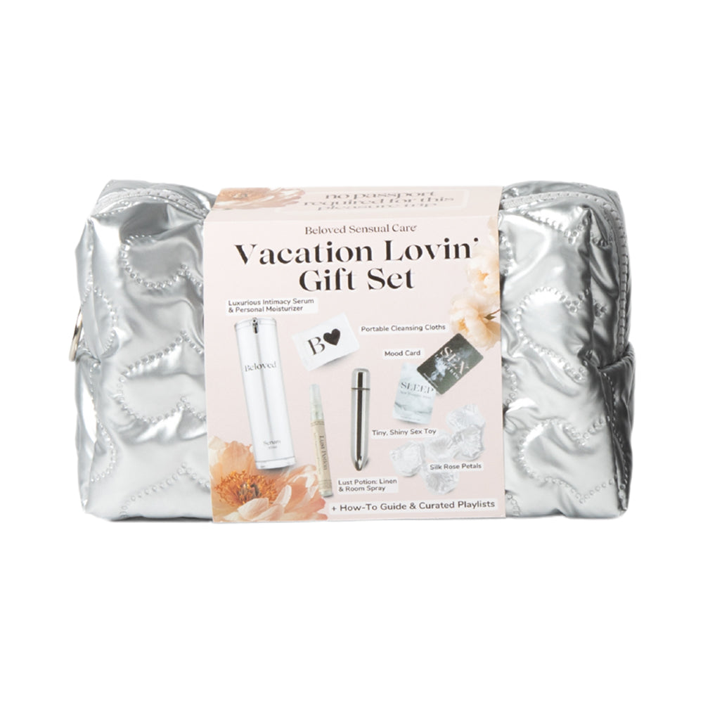 Beloved Vacation Lovin Gift Set silver cosmetic pouch with travel essentials for relaxation and connection.