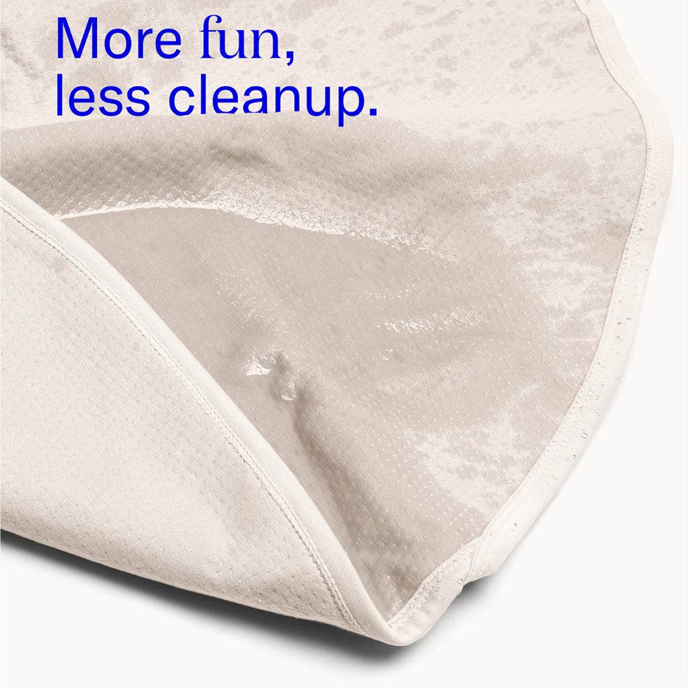 Dame Thro Waterproof Blanket for Play Oat showcasing its easy-clean surface for hassle-free enjoyment.