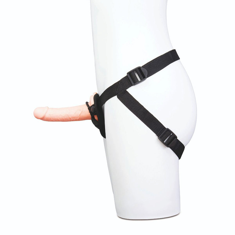 Me You Us Ultracock Harness Kit featuring an adjustable strap-on harness with a realistic dildo attached.