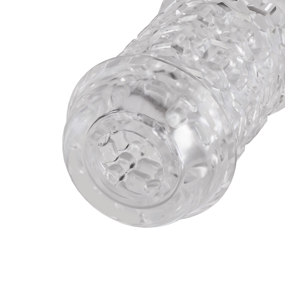 The Handy TrueGrip Gen 2 Masturbator Sleeve Clear with textured exterior and thicker opening for enhanced sensations.