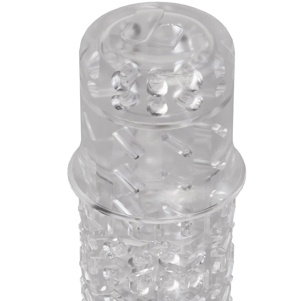 The Handy TrueGrip Gen 2 Masturbator Sleeve Clear with textured exterior for enhanced grip and sensations.