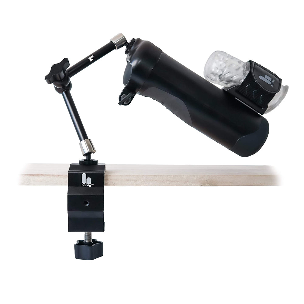 The Handy Handsfree Desk Mount holding a water bottle, showcasing its adjustable articulating arm and sturdy design.