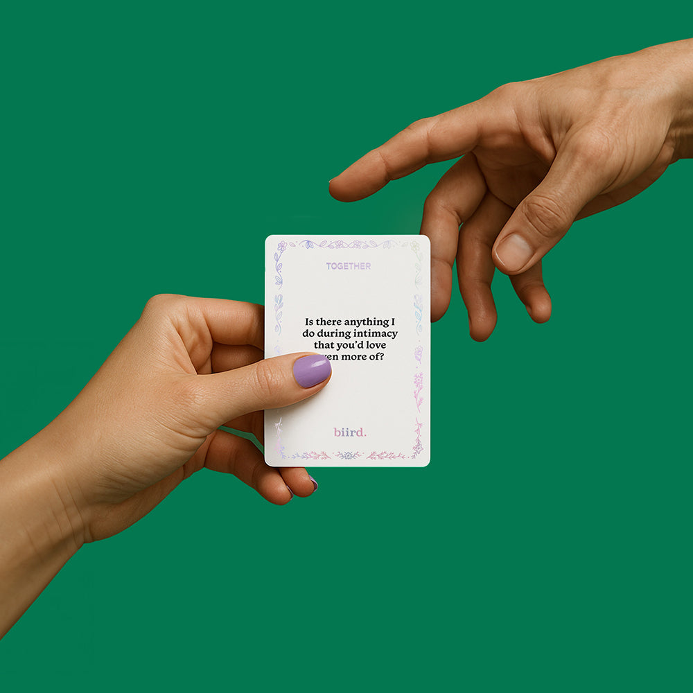 Biird X Jouissance Club Together Couples Card Game in hands, promoting intimacy and connection.