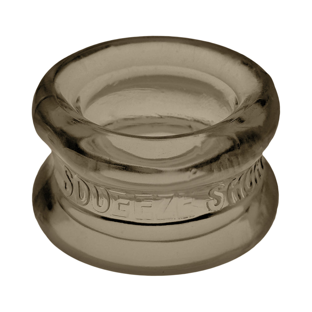 Oxballs Squeeze Short Ballstretcher Storm, a transparent compact ballstretcher designed for snug fit and support.