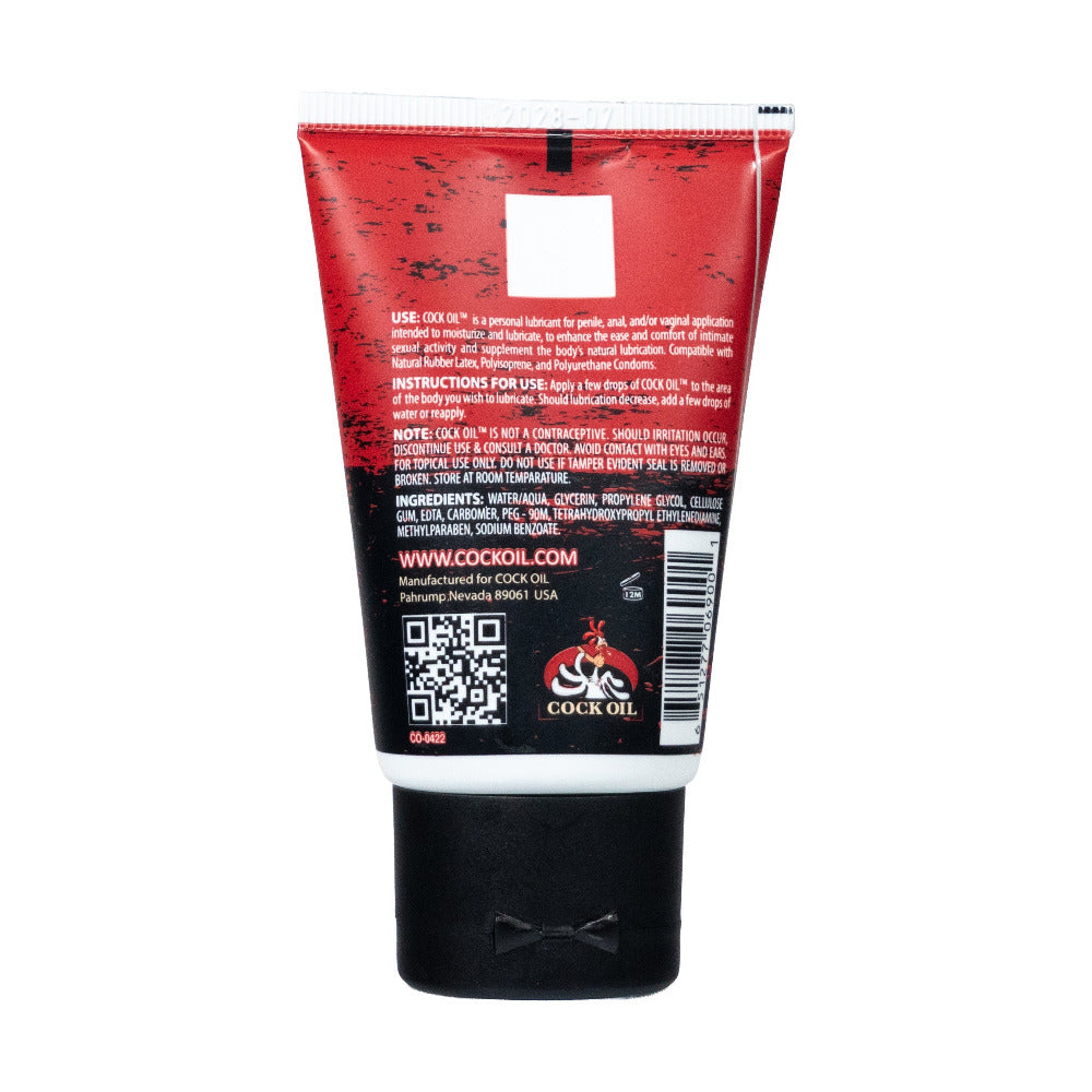 Cock Oil Water-Based Lubricant Squeeze Tube 2 Oz with instructions and ingredients on the back.