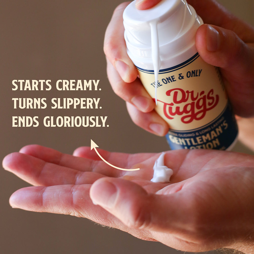 Dr Tuggs Gentlemans Masturbation Lotion 3.4 Oz being dispensed onto a hand, showcasing its creamy texture and smooth application.