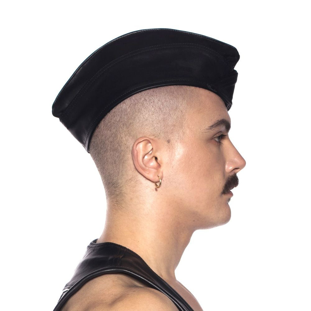 Prowler RED Triangle Cap Black Large 59 cm showcased on a model from the side, highlighting its leather-inspired design.
