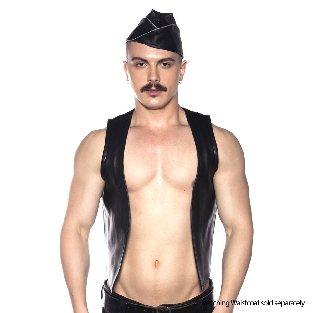 Prowler RED Triangle Cap Grey Large 59 cm worn by a model with leather attire, showcasing a confident style.