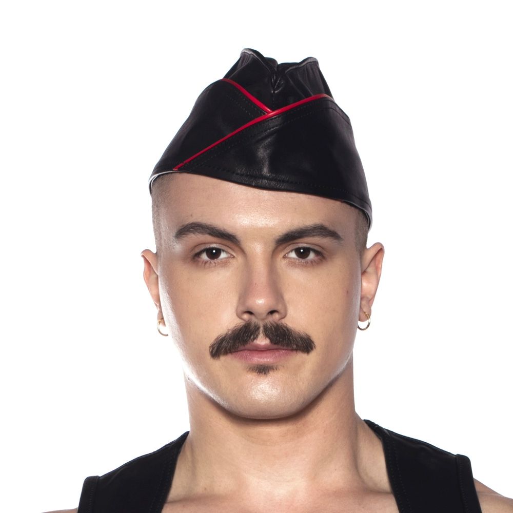 Prowler RED Triangle Cap Medium 57 cm Black and Red worn by a model with a mustache, showcasing its distinctive style.