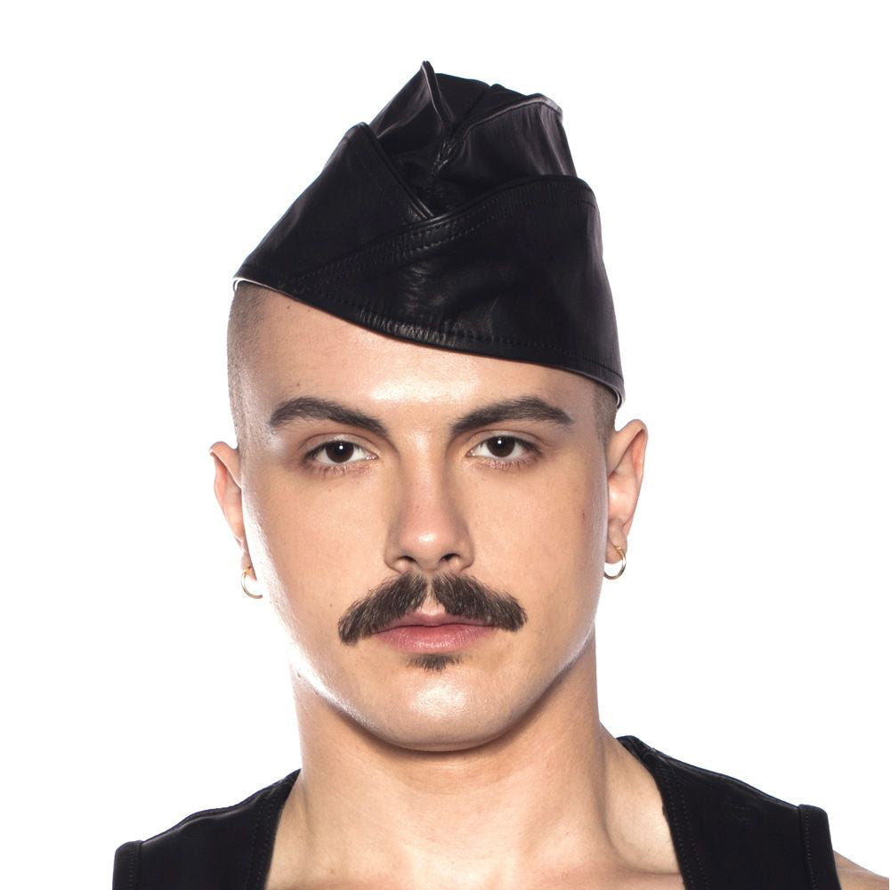 Prowler RED Triangle Cap Small 55 cm Black worn by a model, showcasing its stylish, edgy design.