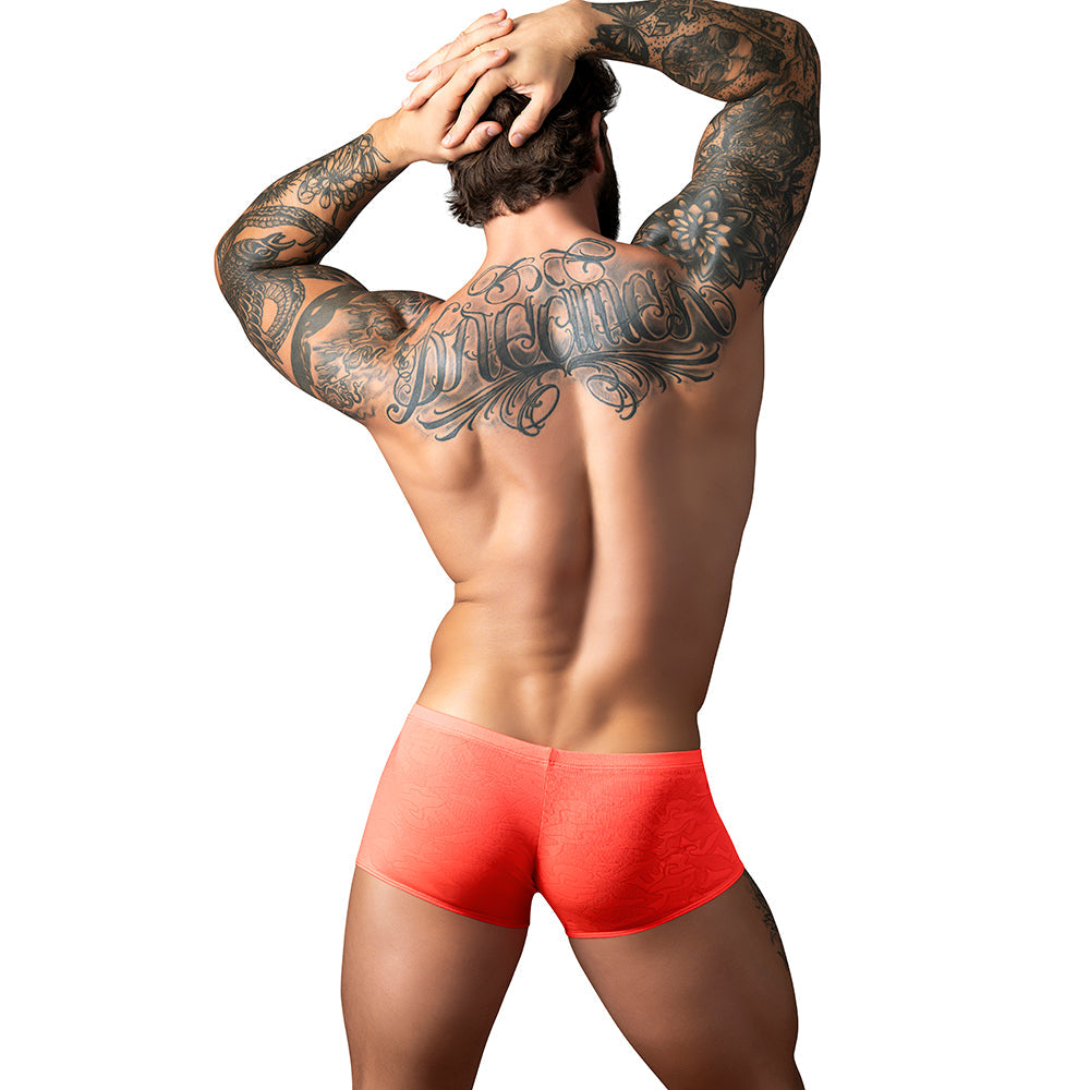 Male Power Kilauea Limited Edition Mini Short Coral XL on a muscular man from behind, showcasing bold design and comfort.