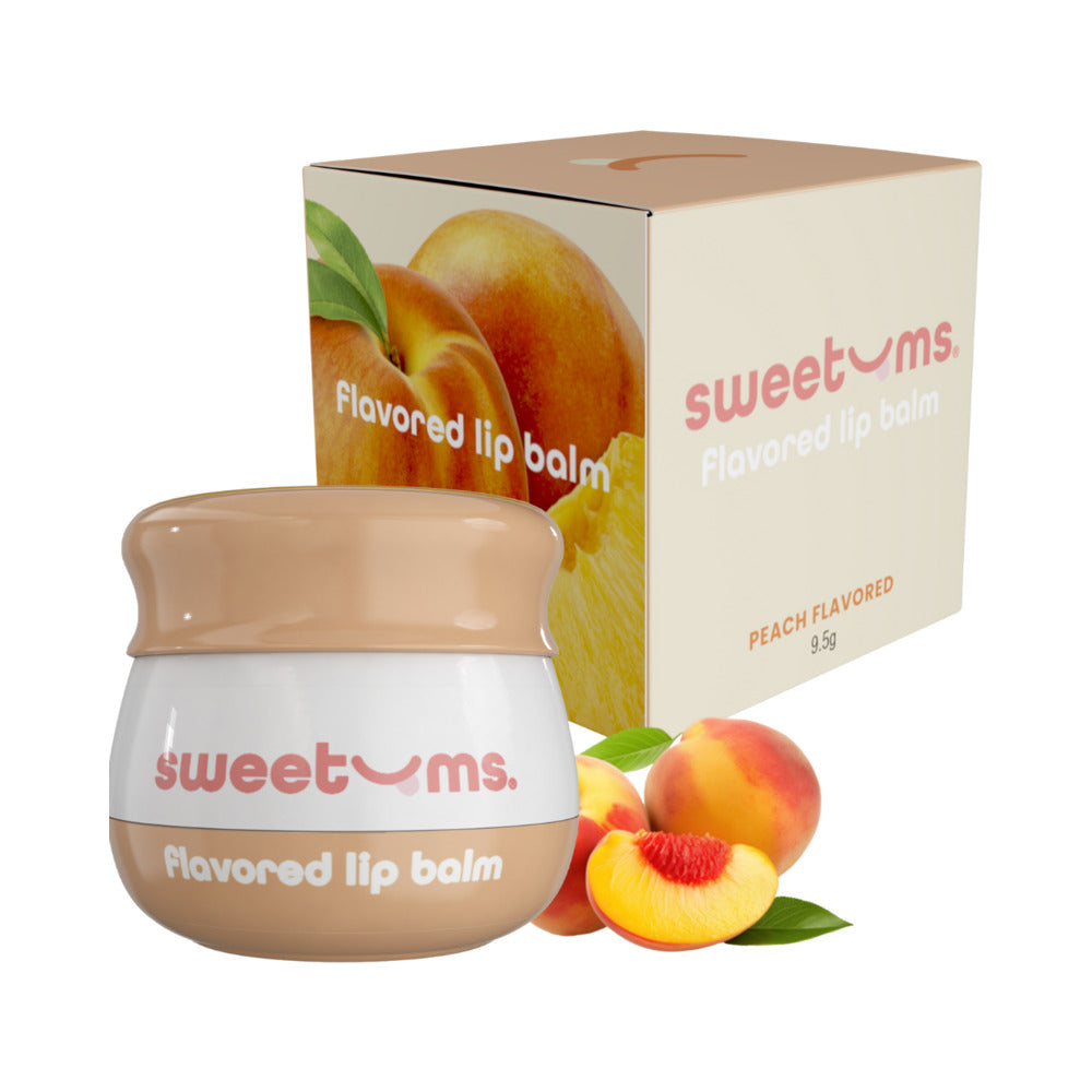 Sweetums Peach Flavored Lip Balm in jar with peaches and box packaging, providing hydration and fruity flavor.