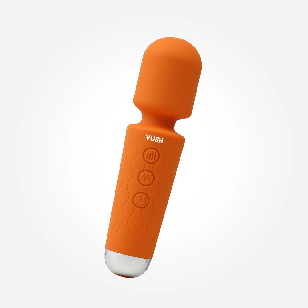 Vush Essentials Mini Wand Vibrator in orange silicone, designed for powerful and customizable pleasure.