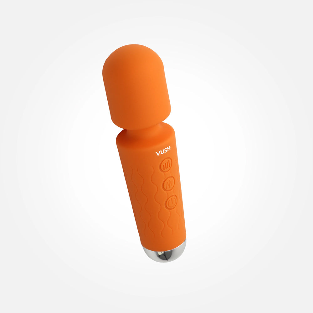 Vush Essentials Mini Wand Vibrator in vibrant orange, featuring smooth silicone and adjustable settings for ultimate pleasure.