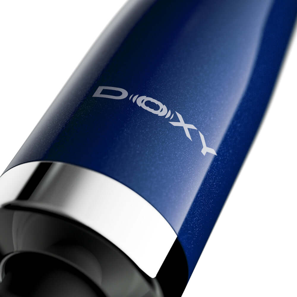 Doxy Die Cast Compact Cordless Wand Massager Blue close-up showing branding detail.