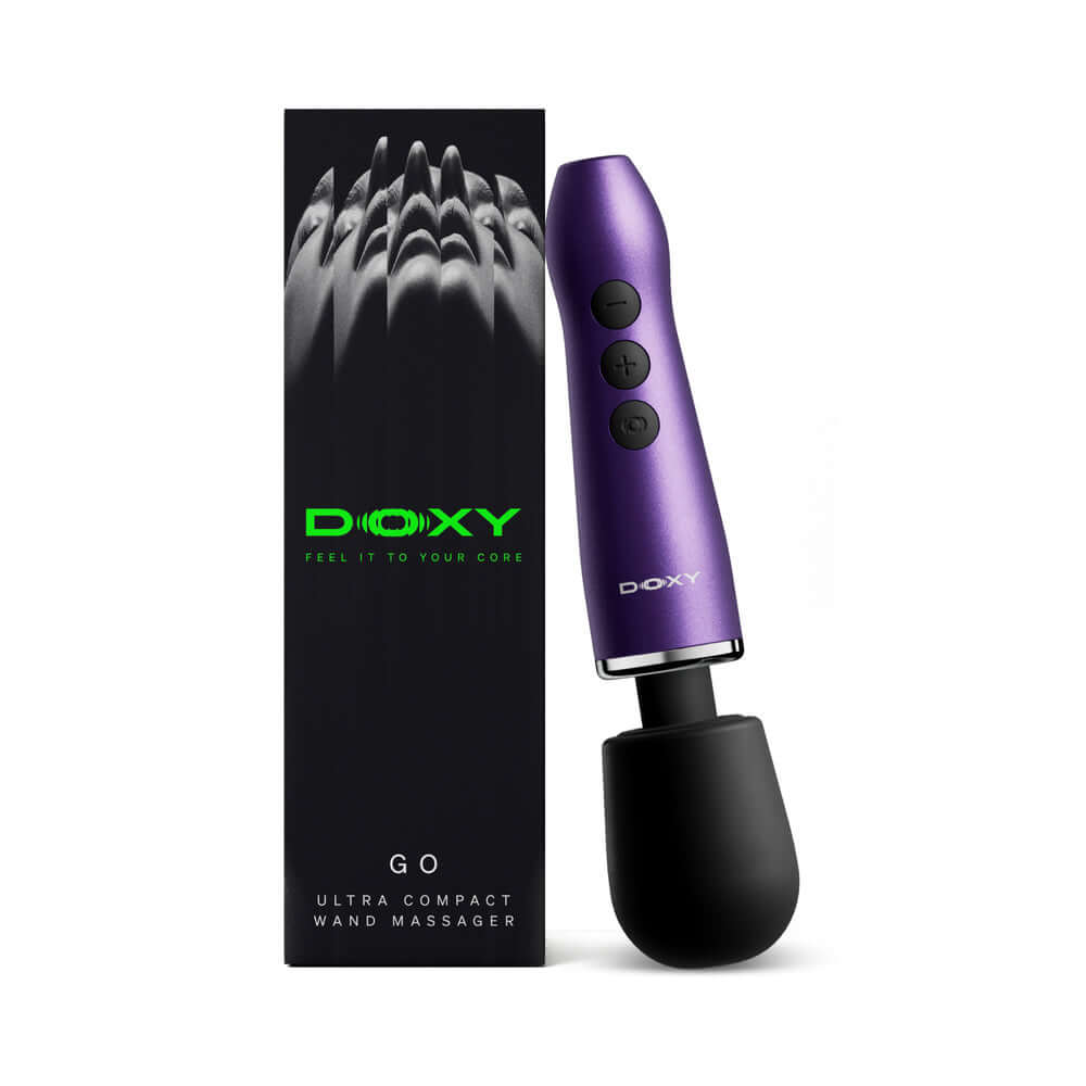 Doxy Go Travel-sized Wand Massager Purple next to its packaging, showcasing its compact design and user-friendly controls.