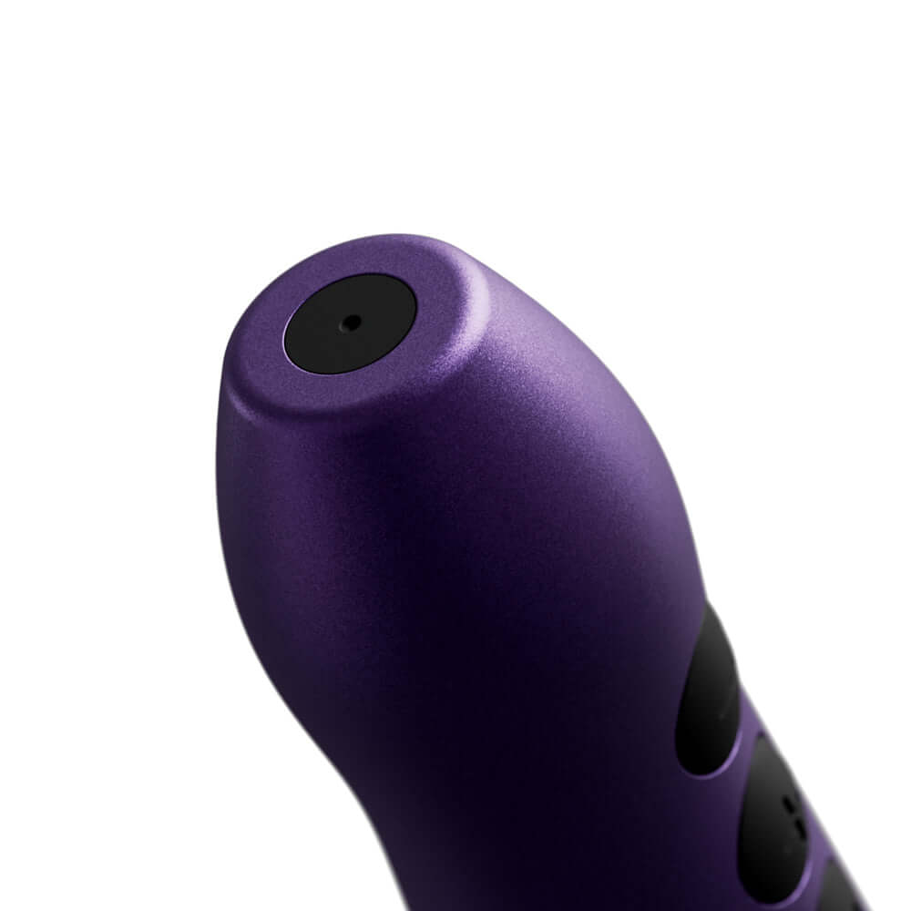 Close-up view of the Doxy Go Travel-sized Wand Massager Purple highlighting its sleek design and buttons.