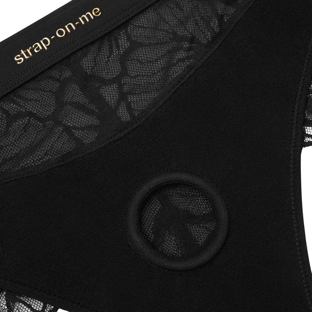 Strap-on-me Sublime Lingerie Harness Large Black featuring lace detailing and a functional ring.