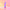 Love To Love Dildo Led Sugar Bomb with colorful LED lights on a soft surface.