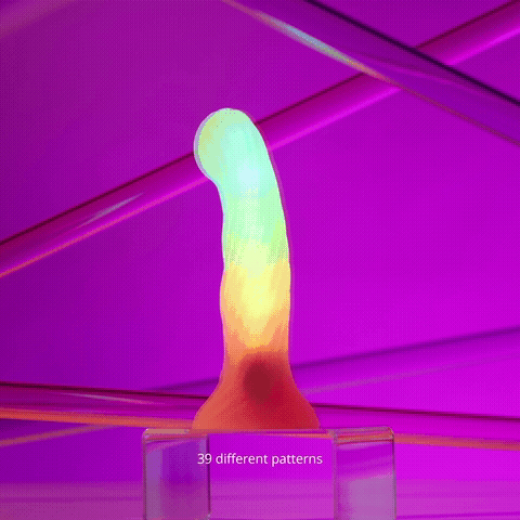 Love To Love Dildo Led Sugar Bomb with vibrant LED lights and 39 different patterns against a colorful background.
