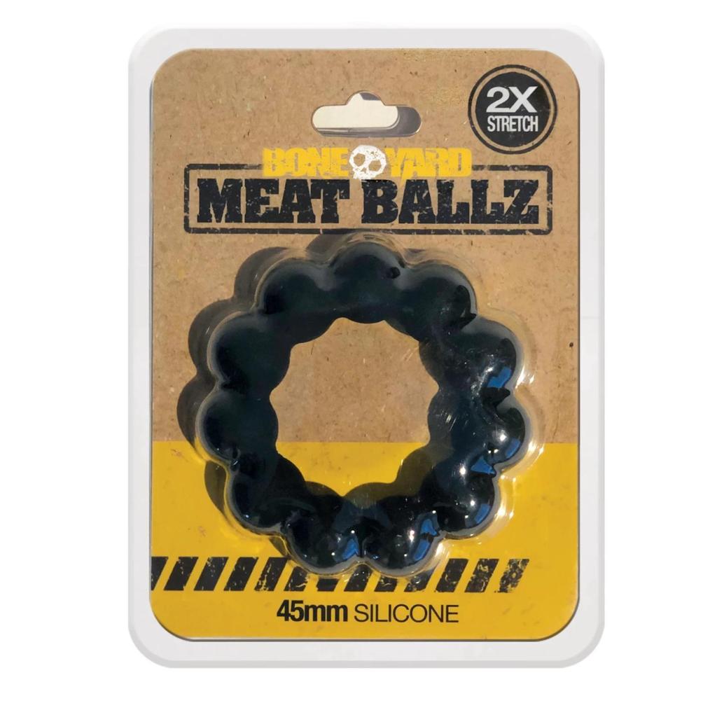 Rascal Meat Ballz Silicone Cock Ring Black in packaging, featuring textured raised balls for added stimulation.