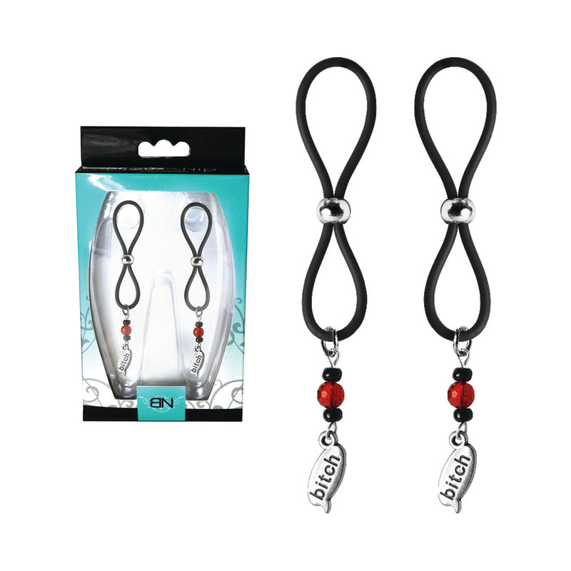 Nipple Halos Bitch Charms Silicone Nipple Jewelry Black with bold charms in packaging.