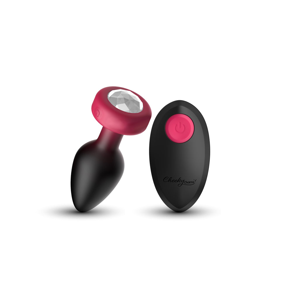 Eluxe Vibrating Ruby Ombre Anal Plug Medium Remote featuring a sleek design with a clear gem base and a remote control.