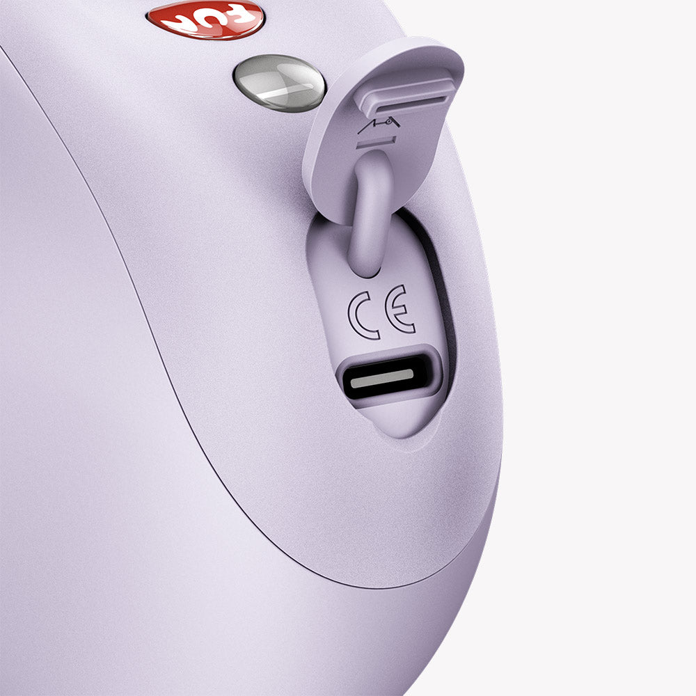 Close-up of the charging port on the Fun Factory Mea Air Pulse Vibrator Purple with a sleek lavender design.