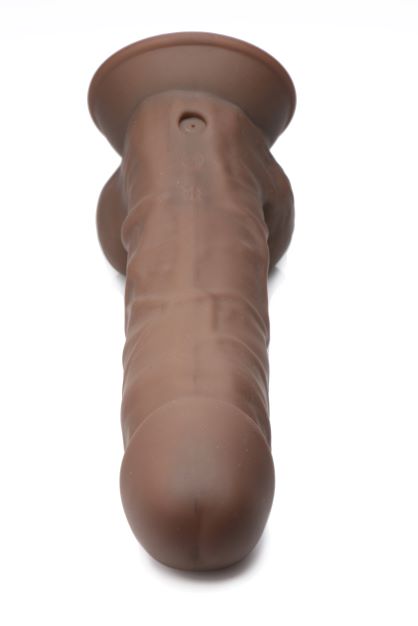 Fleshstixxx 8 Inch Vibrating Dildo With Balls Dark shown in detail, highlighting its lifelike design and flexible silicone.