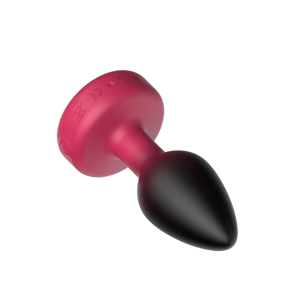 Eluxe Vibrating Ruby Ombre Anal Plug Medium Remote in vibrant pink and black silicone, featuring a remote control for powerful sensations.