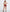 Dreamgirl Homeroom Hottie Schoolgirl Costume Set White Red featuring a crop top and plaid mini skirt.