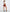 Dreamgirl Homeroom Hottie Schoolgirl Costume Set White Red featuring a model in a crop top and plaid mini skirt.
