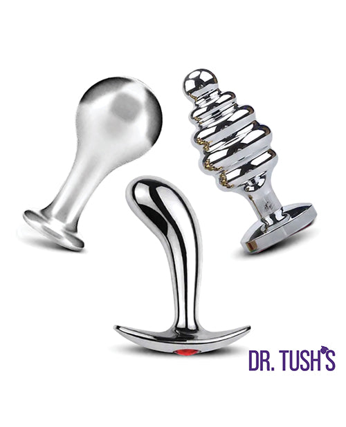 Dr Tush's Tools of Temptation Medium Anal Plug Set Metal featuring three polished metal plugs.
