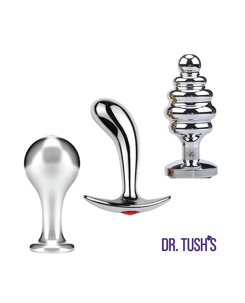 Dr Tush's Tools of Temptation Medium Anal Plug Set Metal featuring three polished metal plugs.
