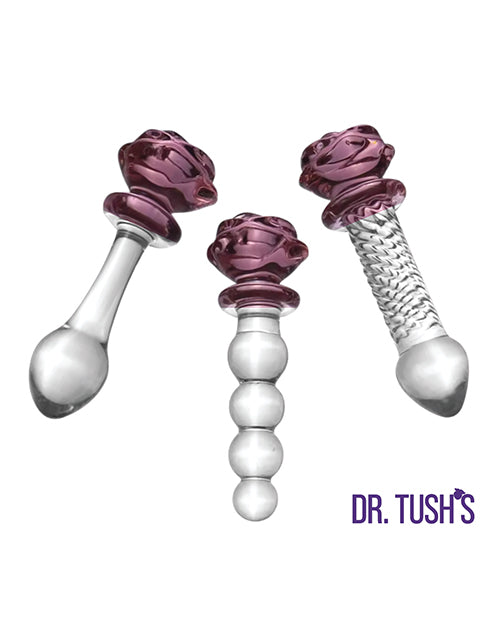 Dr Tush's Sacred Glass Rose Collection Anal Plug Set featuring three elegant hand-blown glass pieces with rose tops.