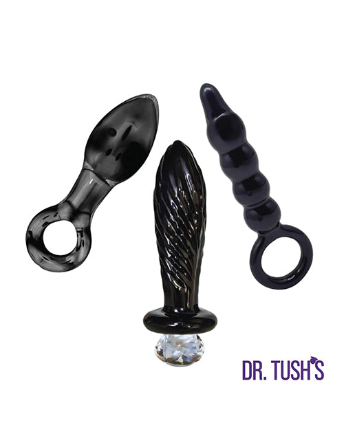 Dr Tush's Dark Curiosity Collection Anal Plug Set Glass showcasing three elegant black glass plugs for adventurous exploration.