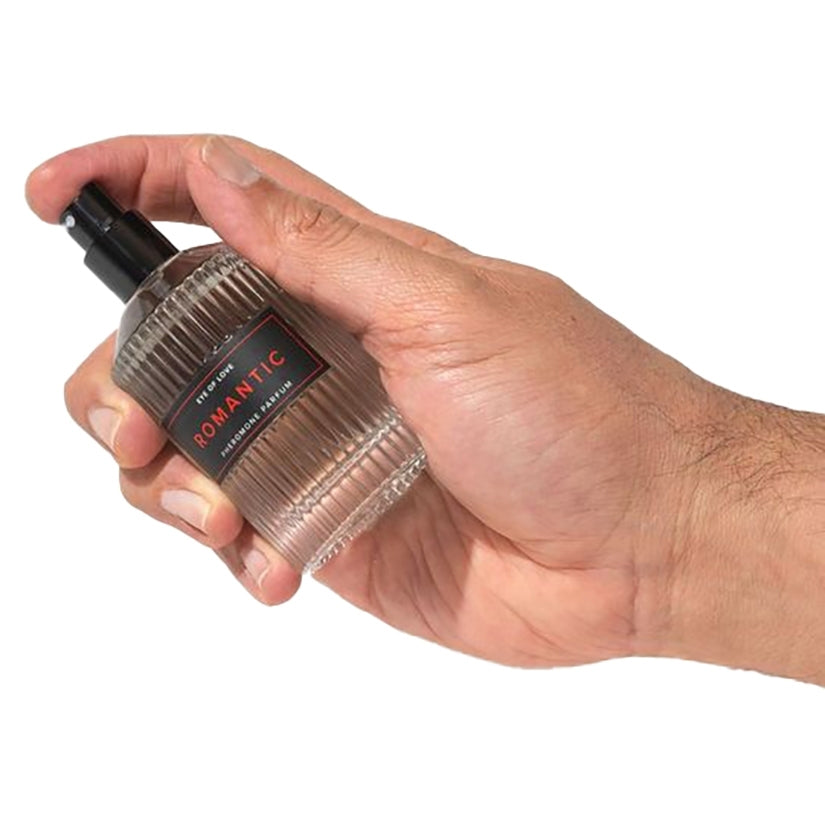 Eye Of Love DX Male Romantic Pheromone Body Spray 50ml in hand, perfect for making a lasting impression.