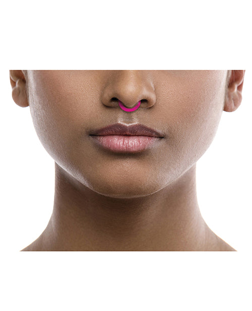 Rave Ring Chill Single Sachet Peppermint Scent Pink worn on the septum of a person for a cool, refreshing experience.