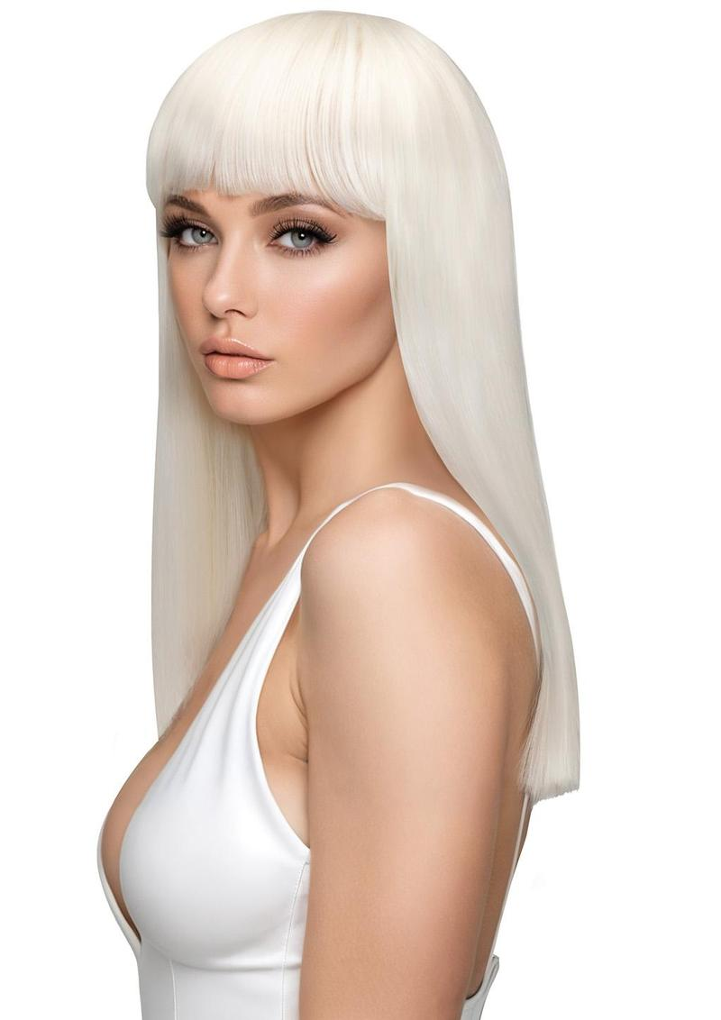 Odessa Premium Stylable Wig Platinum on a model, showcasing a sleek and radiant platinum hairstyle.