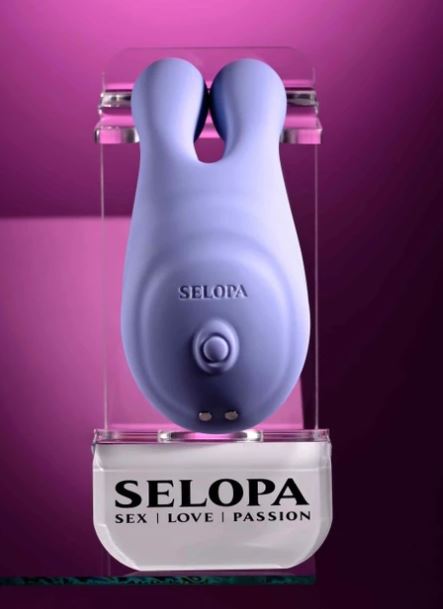 Selopa Handsy Rechargeable Silicone Palm Vibrator Blue displayed in packaging on a purple background.
