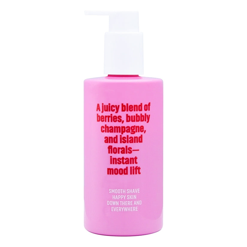 Coochy Shave Cream Berry Bliss 8 Oz in a pink bottle with berry and floral scent for smooth skin.