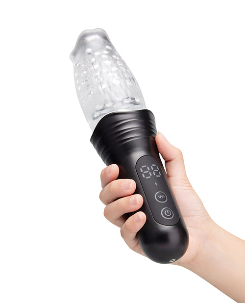 He-Vibe The Original Gluk Gulk Automatic Masturbator held in hand with digital display and textured sleeve.