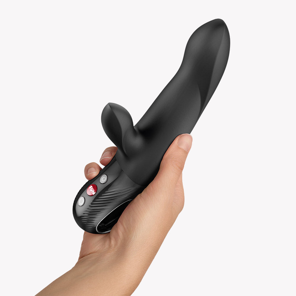 Fun Factory Bi Stronic Arc Vibrator Black held in hand, showcasing its ergonomic design and dual stimulation features.