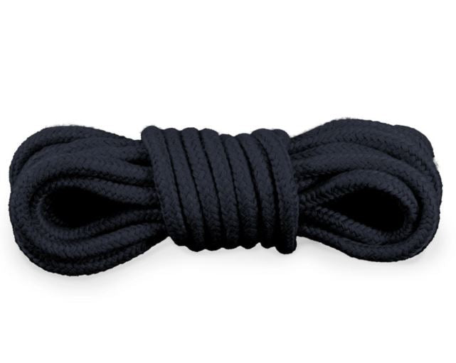 Kink Curious Bondage Rope Black laid out, perfect for exploring restraint in a comfortable way.