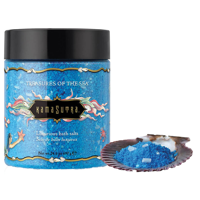 Kama Sutra Treasures Of The Sea Bath Salts 24.5 Oz in jar with blue bath salt on shell, perfect for luxurious bathing.