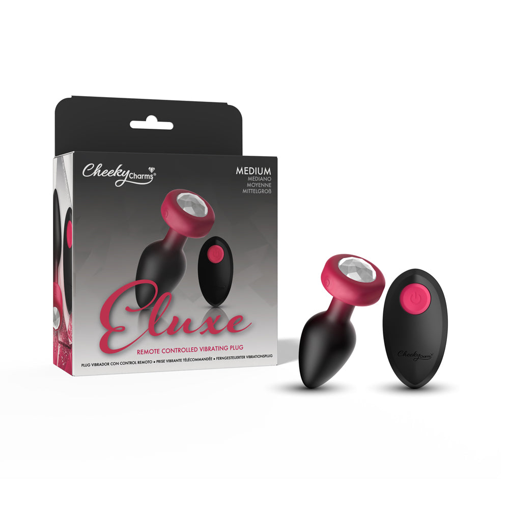 Eluxe Vibrating Ruby Ombre Anal Plug Medium Remote with remote control and packaging, designed for pleasure and style.